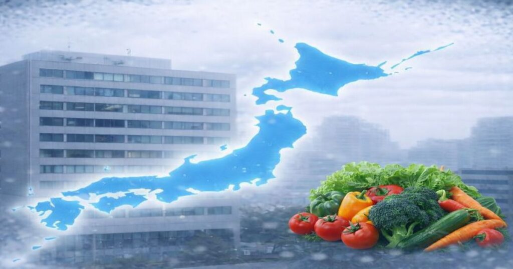 都市の企業ビルと日本地図を背景に新鮮な野菜が並ぶ食と企業のイメージ