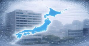 雪が降る都市のオフィス街と日本地図で表現した企業倒産の全国的影響イメージ